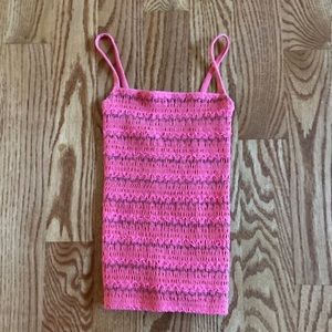 Pink top with green accents